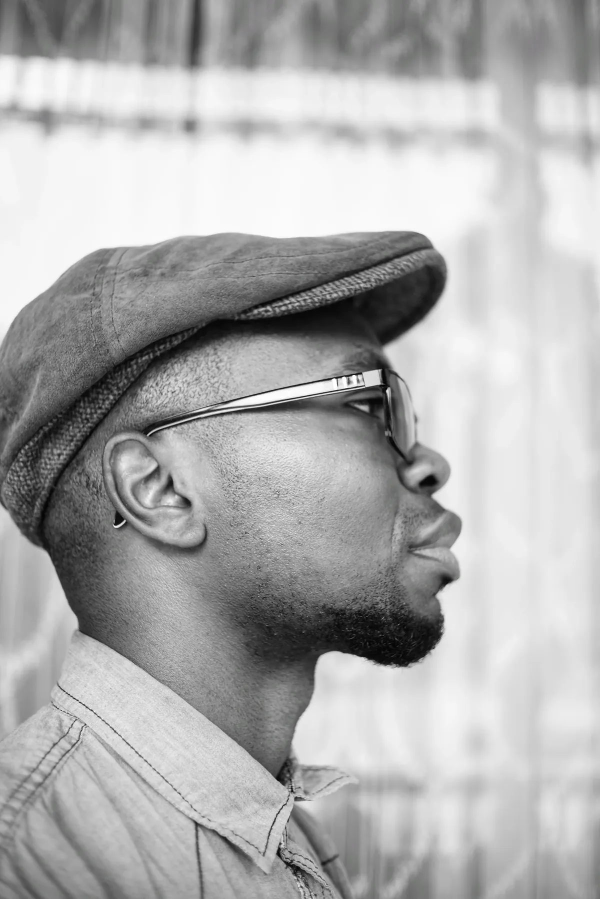 Mwiza black-and-white headshot portrait